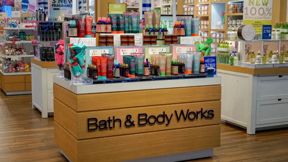 bath and body works outlet with alot of scents on table