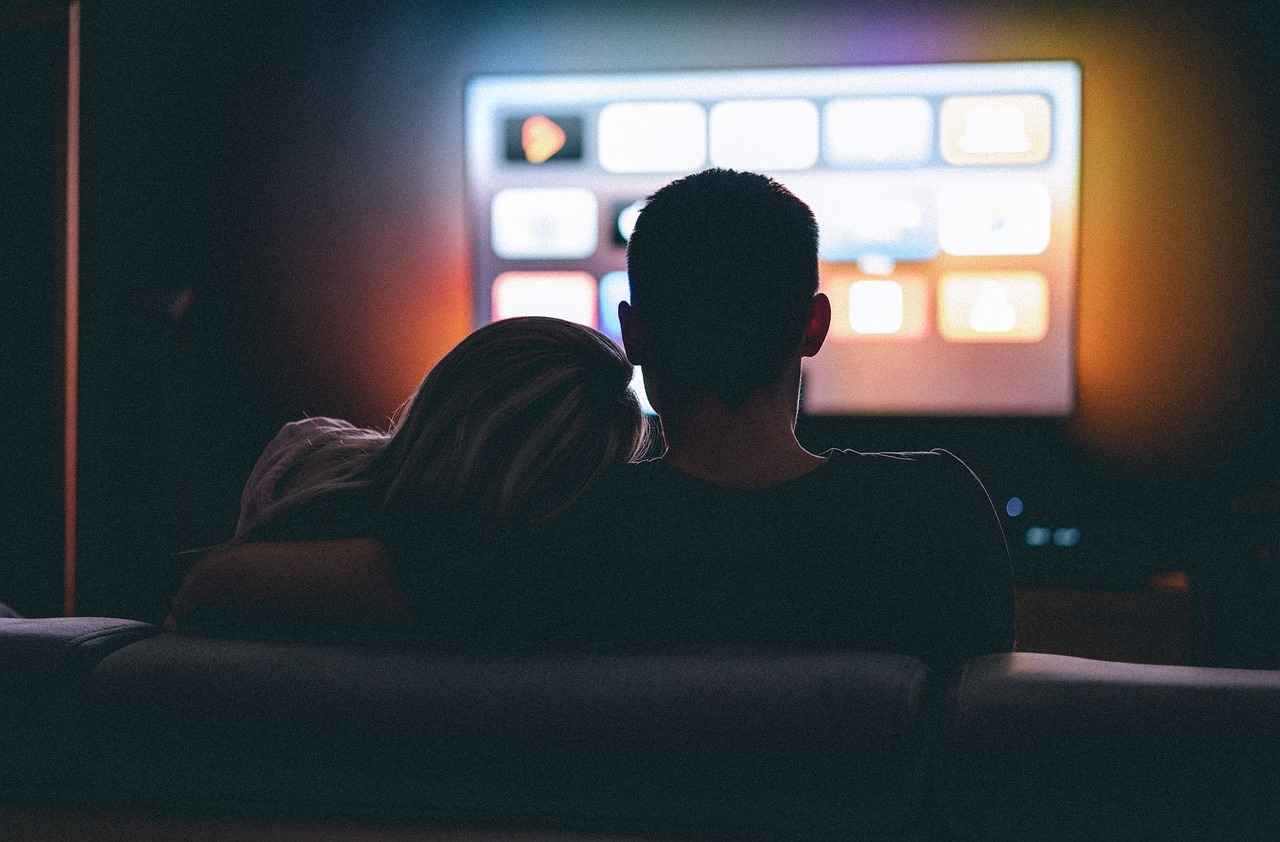 Couple is watching Tv series